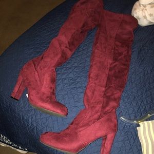 Red/burgundy knee high heeled boots